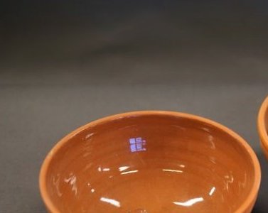 Dorte Visby keramik - lille lertøjsskål i rødler med klar glasur indvendigt.